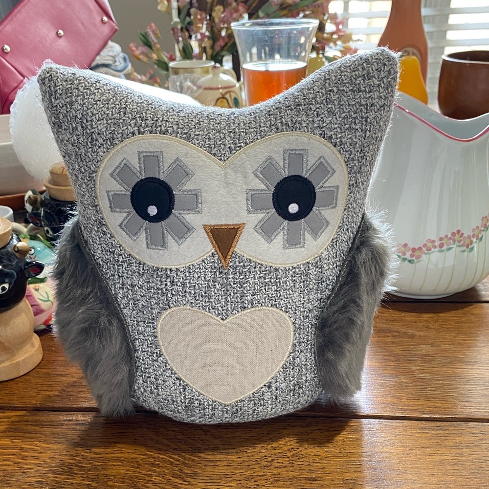 This is an Elements Weighted Fabric  Owl Door Stopper.  NWOT.  9 inches tall.